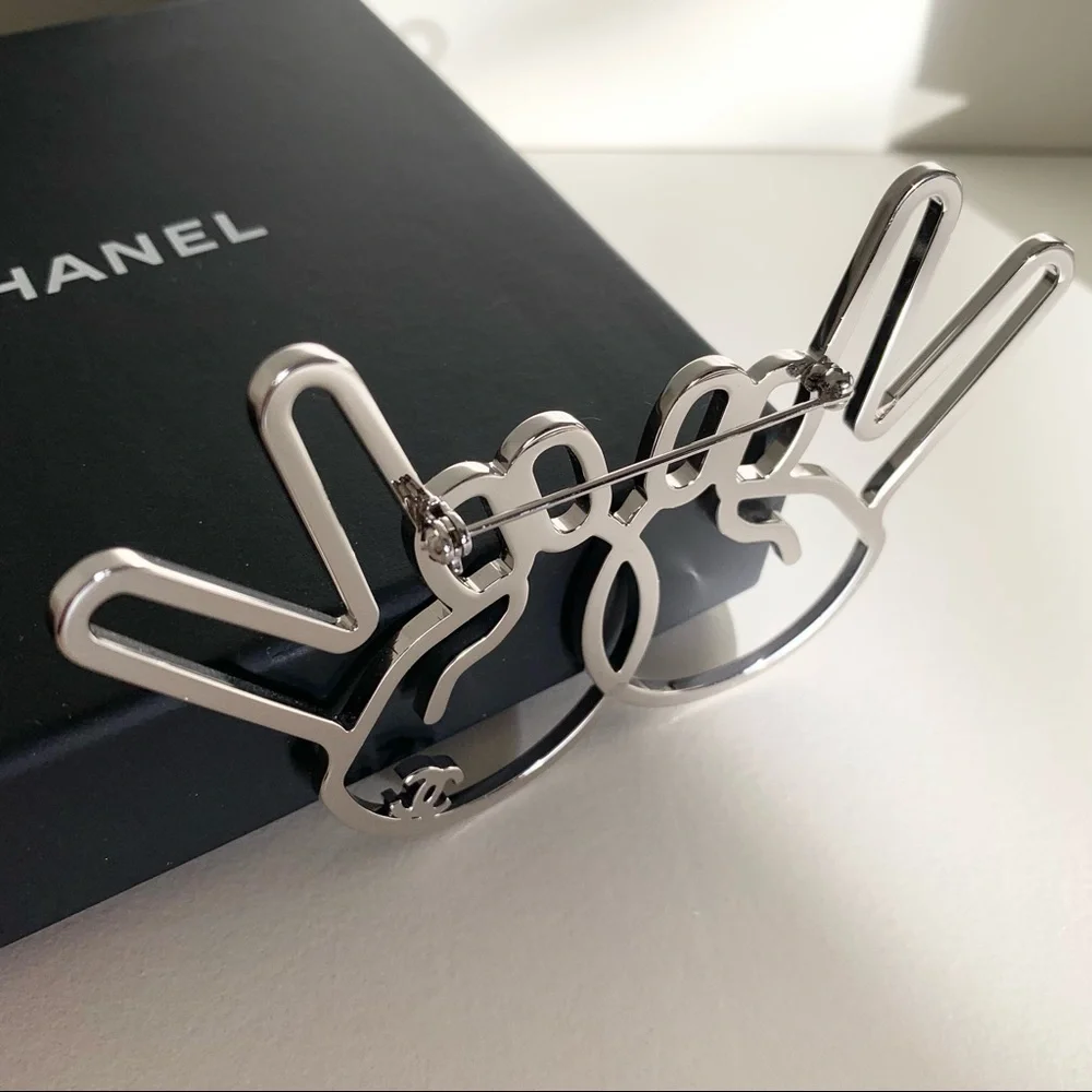 Chanel large peace hands pin
